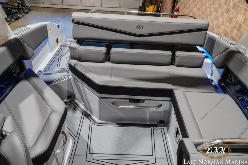 Slide: The Image of 2026 Cobalt R4 Surf boat interior with sleek gray seating and modern design. - 21