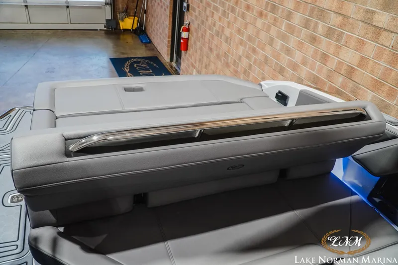 Slide: The Image of 2026 Cobalt R4 Surf boat interior with sleek gray seating and modern design. - 22