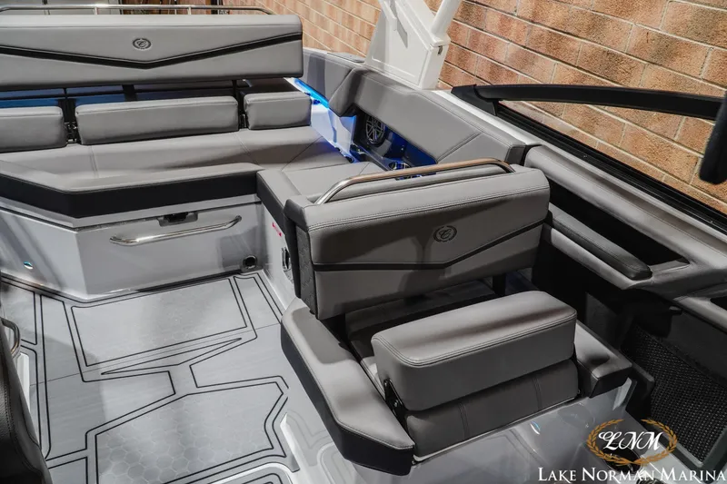 Slide: The Image of 2026 Cobalt R4 Surf boat interior with sleek gray seating and modern design. - 20