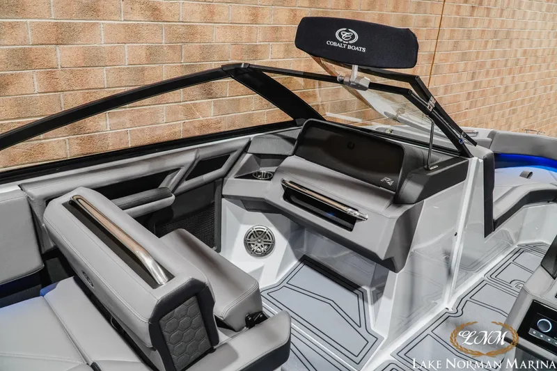 Slide: The Image of 2026 Cobalt R4 Surf boat interior with sleek design and modern dashboard features. - 15