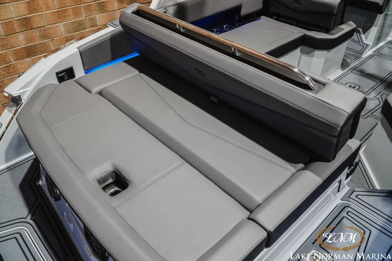 Slide: The Image of 2026 Cobalt R4 Surf boat interior with sleek gray seating and modern design. - 10