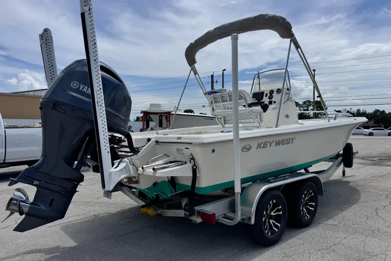 Slide: The Image of 2023 Key West 230 Bay Reef boat on trailer with Yamaha outboard motor. - 5