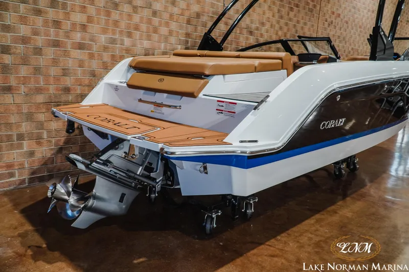 Slide: The Image of 2026 Cobalt CS23 boat with sleek design, showcased at Lake Norman Marina. - 6