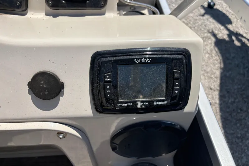 Slide: The Image of Control panel of a 2017 Qwest LS 822 Bar boat featuring an Infinity PRV-350 stereo system. - 15