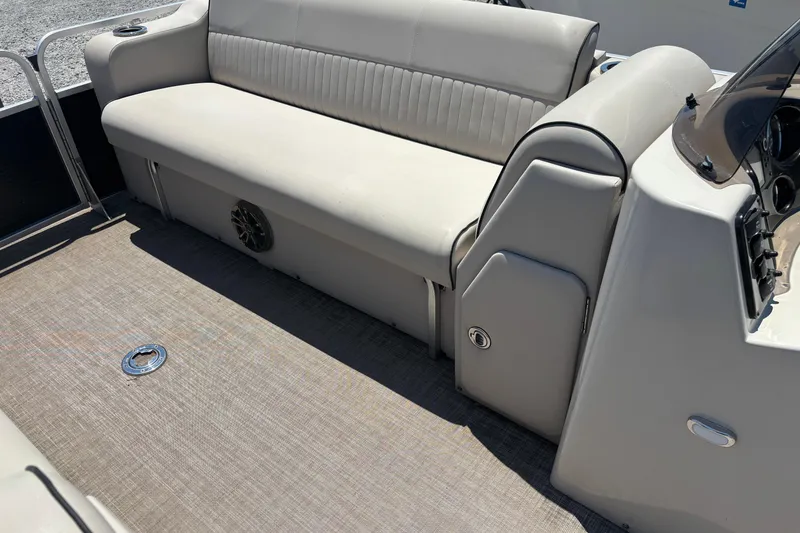 Slide: The Image of Interior of 2017 Qwest LS 822 Bar pontoon boat with beige seating and flooring. - 8