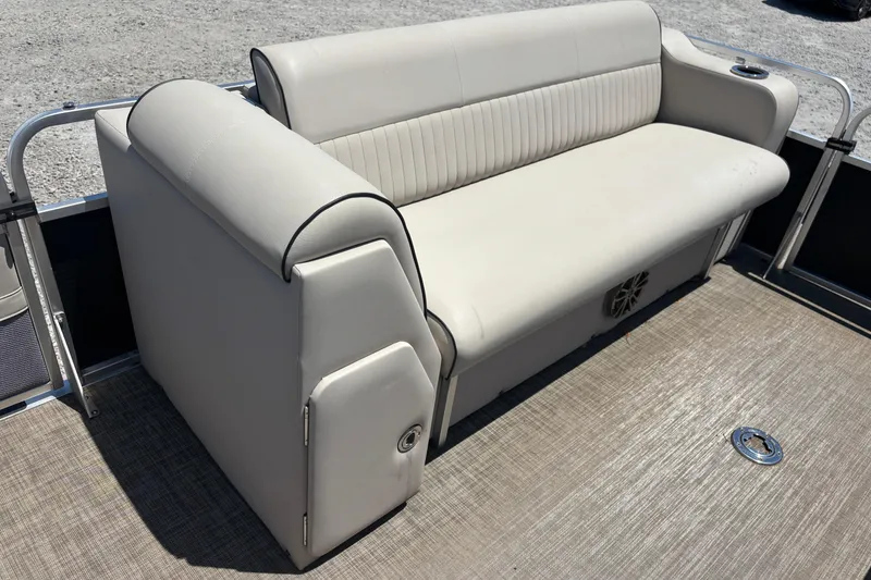 Slide: The Image of 2017 Qwest LS 822 Bar boat with beige seating on deck. - 7