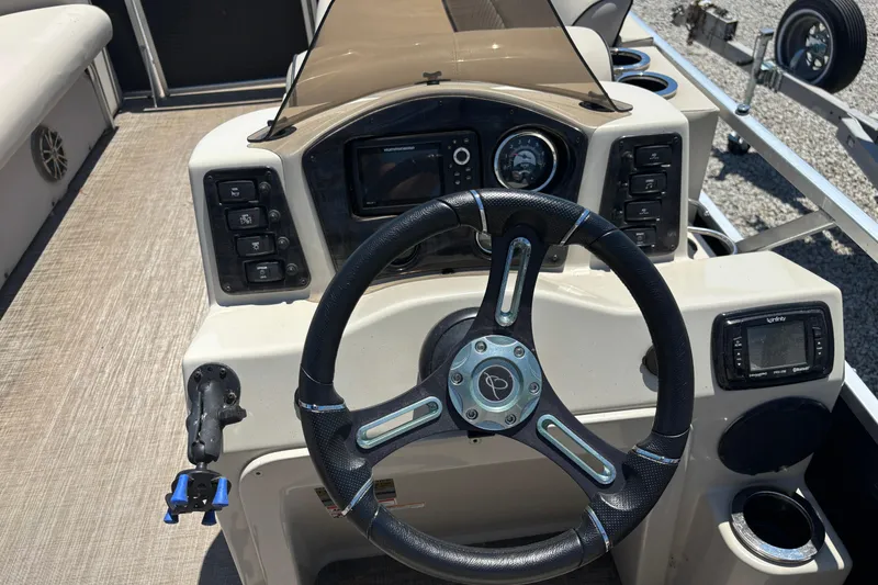 Slide: The Image of Steering console of 2017 Qwest LS 822 Bar pontoon boat with control panel and gauges. - 13