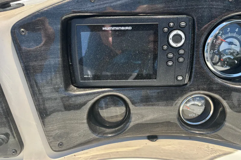 Slide: The Image of Dashboard of a 2017 Qwest LS 822 Bar with Humminbird Helix 5 display and gauges. - 14