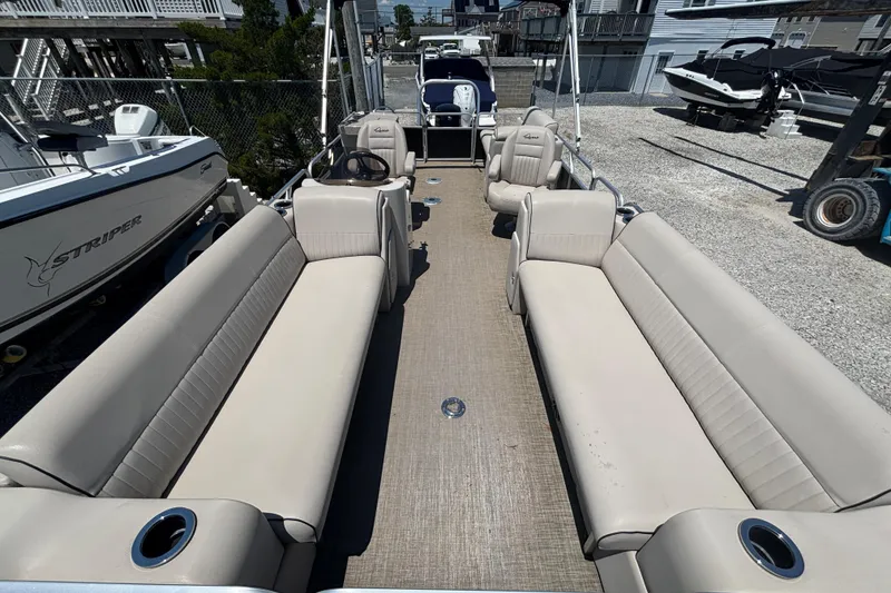Slide: The Image of 2017 Qwest LS 822 Bar pontoon boat with spacious seating and modern design. - 6