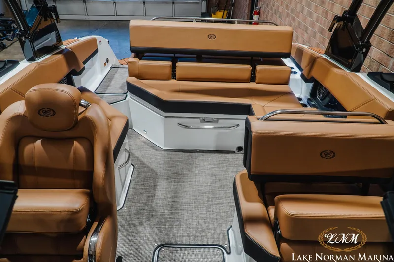 Slide: The Image of Luxurious interior of 2026 Cobalt R4 boat with tan leather seating at Lake Norman Marina. - 20