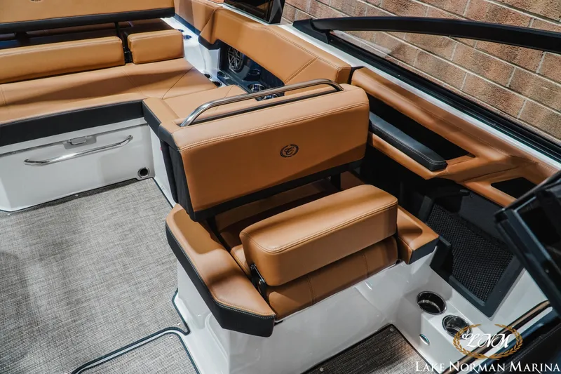 Slide: The Image of Luxurious interior of 2026 Cobalt R4 boat with tan leather seating. - 21