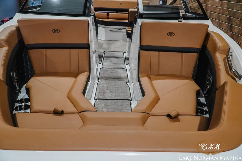 Slide: The Image of 2026 Cobalt R4 boat interior with tan leather seating and modern design at Lake Norman Marina. - 5