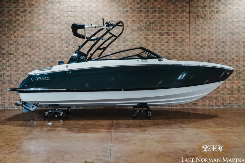 The Image of 2026 Cobalt R4 boat displayed indoors at Lake Norman Marina. - 1