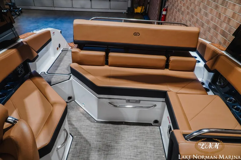 Slide: The Image of Luxurious interior of 2026 Cobalt R4 boat with tan leather seating at Lake Norman Marina. - 22