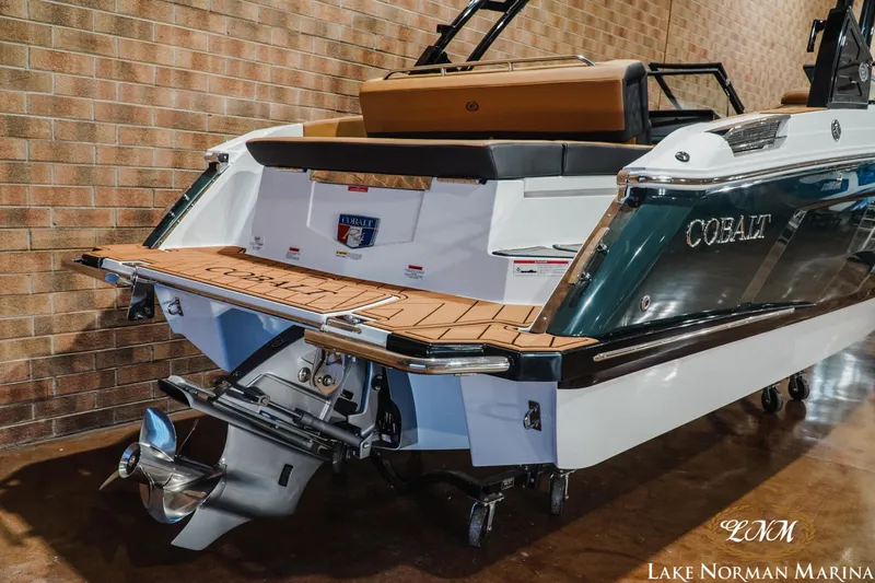 Slide: The Image of 2026 Cobalt R4 boat with sleek design and modern features at Lake Norman Marina. - 8