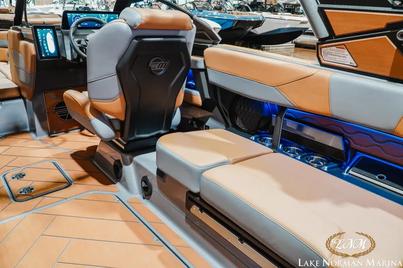 Slide: The Image of Interior of 2026 Malibu Wakesetter 23 LSV boat with luxurious seating and modern dashboard. - 12