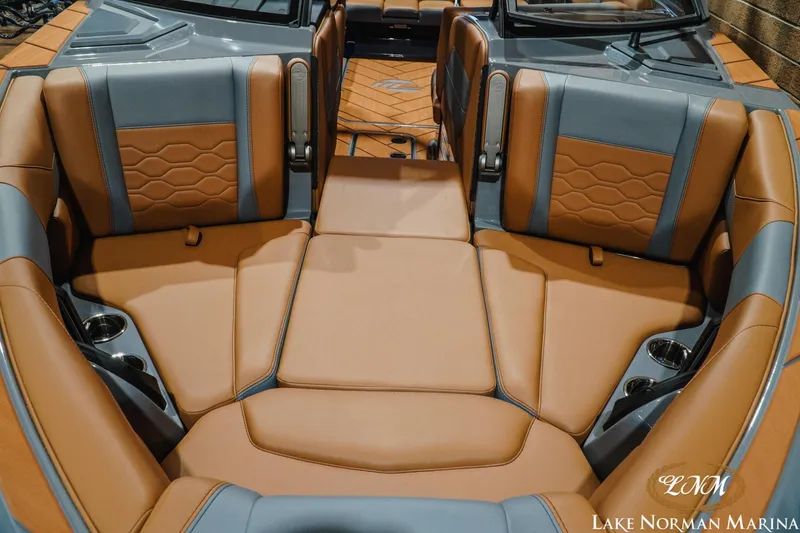 Slide: The Image of 2026 Malibu Wakesetter 23 LSV interior with luxurious brown and gray seating. - 5