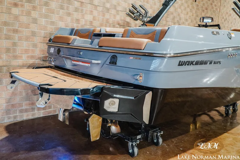 Slide: The Image of 2026 Malibu Wakesetter 23 LSV boat displayed indoors at Lake Norman Marina. - 6