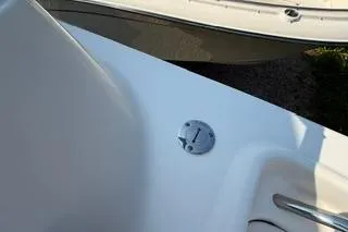 Slide: The Image of 2015 Grady-White Freedom 225 boat deck with metal fixture detail. - 32
