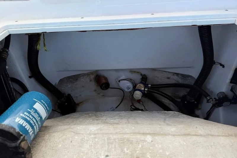 Slide: The Image of 2017 Sportsman Open 232 Center Console boat interior wiring and components. - 36