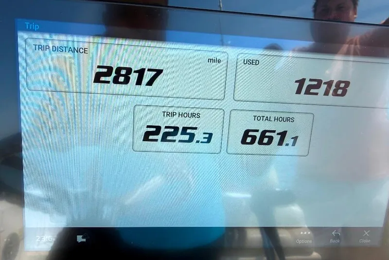 Slide: The Image of Display screen showing trip data: 2817 miles, 1218 used, 225.3 trip hours, 661.1 total hours. - 9