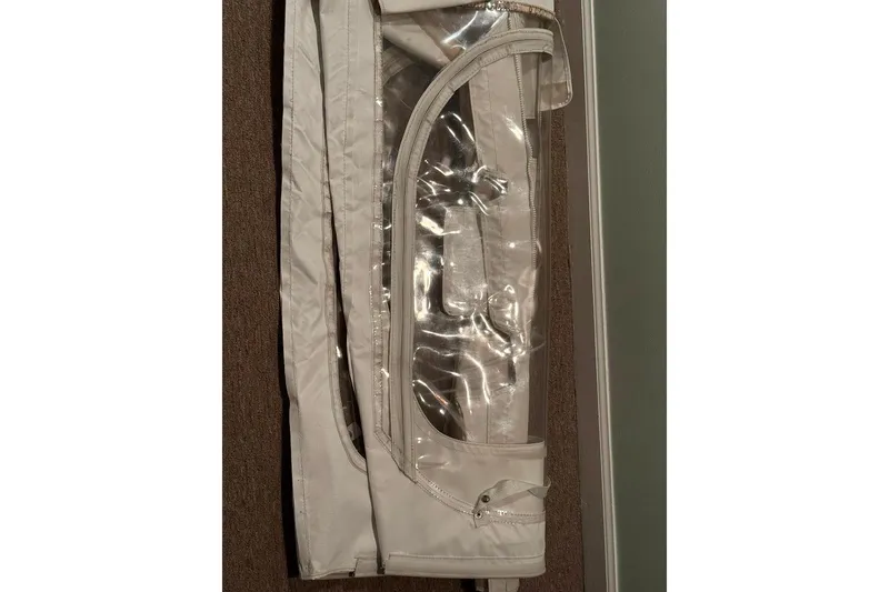 Slide: The Image of Protective cover for 2017 Sportsman Open 232 Center Console boat, featuring clear vinyl window. - 48