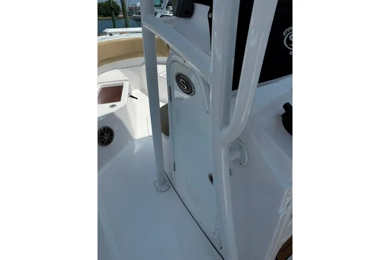 Slide: The Image of 2017 Sportsman Open 232 Center Console boat interior with seating and storage. - 40