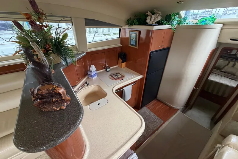 Slide: The Image of Luxurious interior of 2002 Sea Ray 480 Motor Yacht with elegant decor and modern amenities. - 25