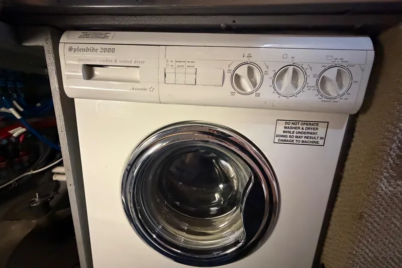 Slide: The Image of Splendide 2000 washer and dryer in 2002 Sea Ray 480 Motor Yacht. - 37
