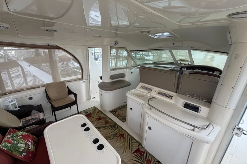 Slide: The Image of Interior of 2002 Sea Ray 480 Motor Yacht with seating and helm station. - 6