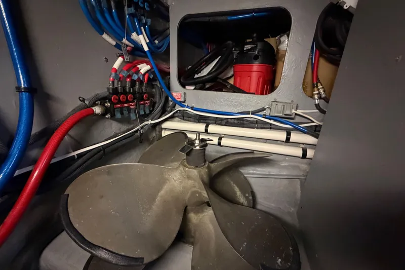 Slide: The Image of Engine room of 2002 Sea Ray 480 Motor Yacht with propeller and wiring. - 34