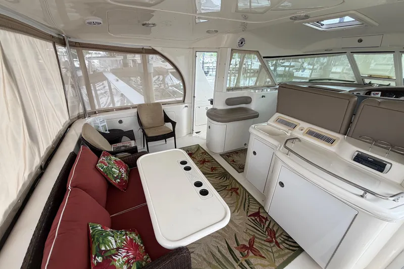 Slide: The Image of Luxurious interior of a 2002 Sea Ray 480 Motor Yacht with comfortable seating and elegant decor. - 5