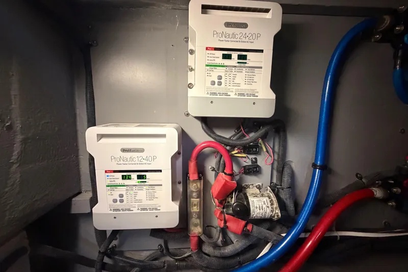 Slide: The Image of ProNautic battery chargers in a 2002 Sea Ray 480 Motor Yacht engine room. - 33