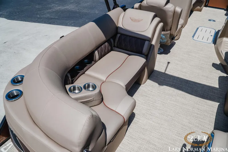 Slide: The Image of Luxurious seating on 2024 Bennington 24LXSFB pontoon boat with cup holders and premium upholstery. - 7