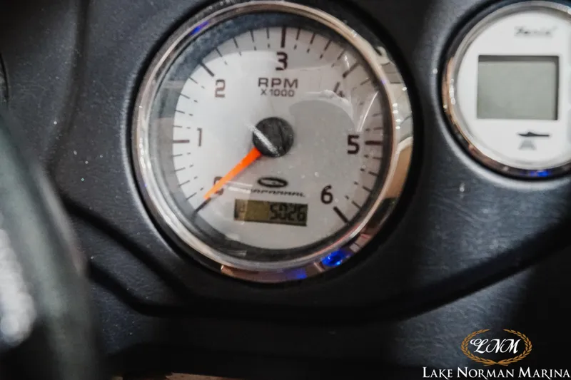 Slide: The Image of Close-up of 2011 Chaparral 246 SSi tachometer displaying RPM and digital readout. - 20