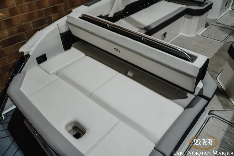 Slide: The Image of 2024 Cobalt R8 boat interior with luxurious white seating at Lake Norman Marina. - 9