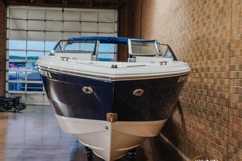 Slide: The Image of 2024 Cobalt R8 boat in showroom, featuring sleek design and modern aesthetics. - 6