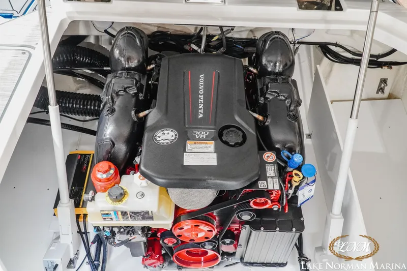 Slide: The Image of 2024 Cobalt R8 engine compartment featuring a Volvo Penta 380 V8 engine at Lake Norman Marina. - 23