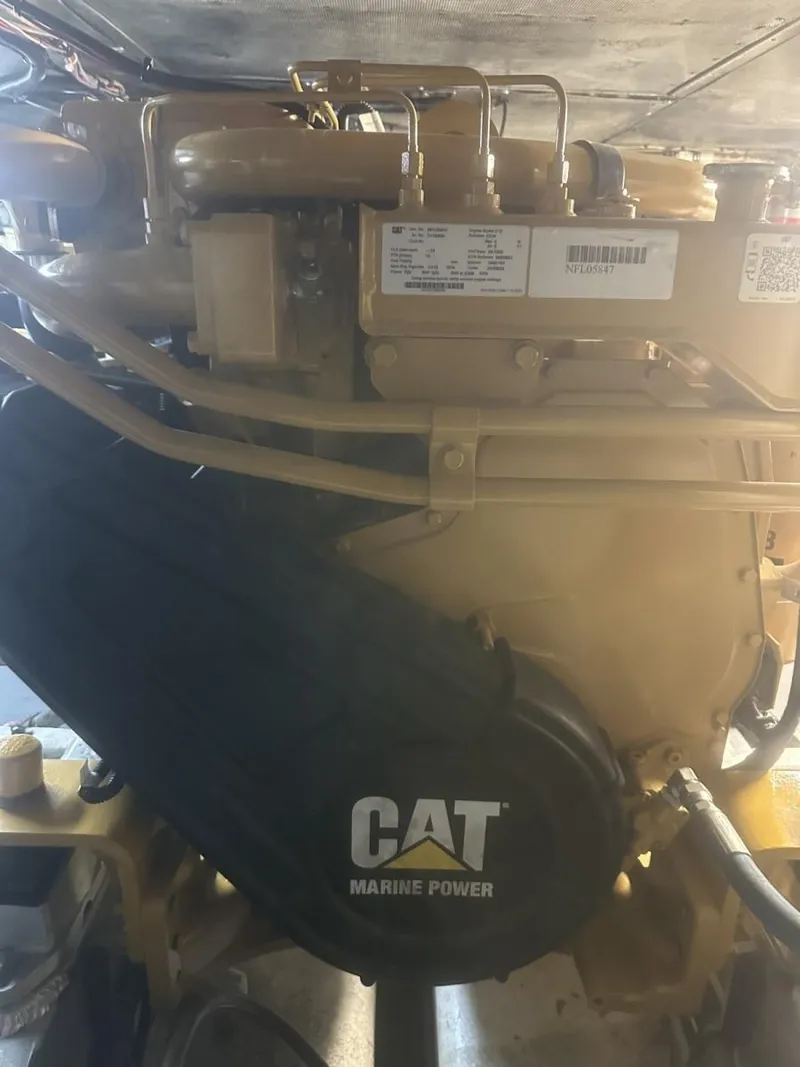 Slide: The Image of CAT Marine Power engine in a 1987 Miller Sportfish 55 boat. - 9