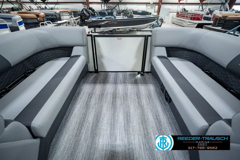 Slide: The Image of 2027 Bennington 22 SSR pontoon boat interior with gray seating and carpeted flooring. - 34