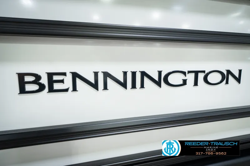 Slide: The Image of Bennington 22 SSR 2027 boat logo with Reeder-Trausch Marine contact details. - 57