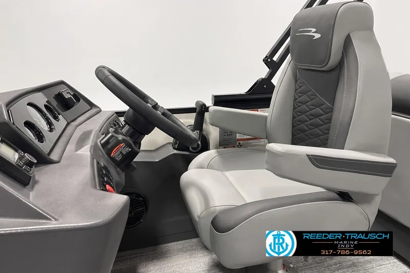 Slide: The Image of 2027 Bennington 22 SSR boat helm with steering wheel and luxurious captain's chair. - 3