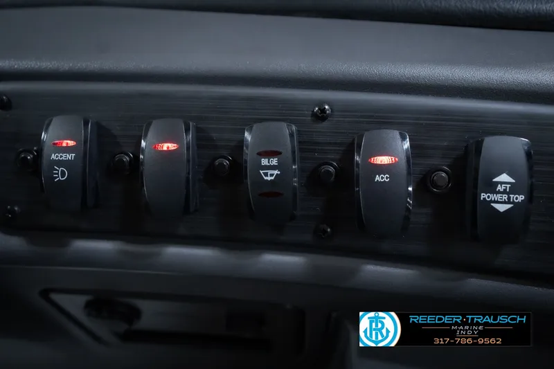Slide: The Image of Control panel of 2027 Bennington 22 SSR boat with labeled switches. - 45