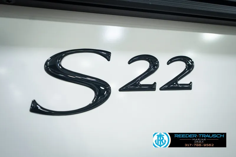 Slide: The Image of Close-up of Bennington 22 SSR 2027 model emblem on white surface. - 58