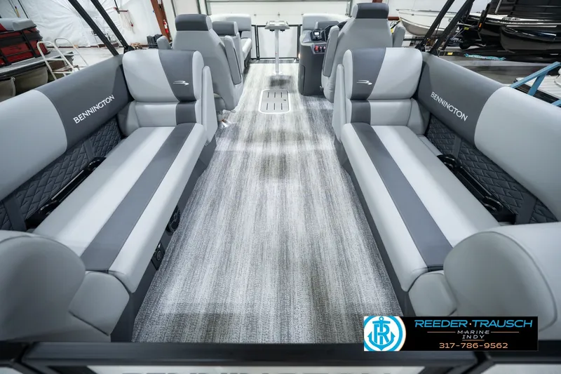 Slide: The Image of 2027 Bennington 22 SSR pontoon boat interior with gray seating and modern design. - 22