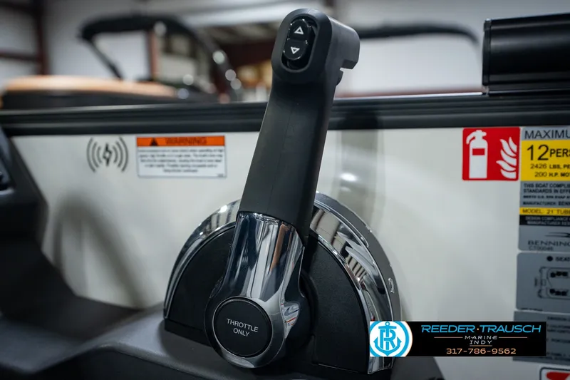 Slide: The Image of Throttle control of 2027 Bennington 22 SSR boat with safety warnings and branding. - 46