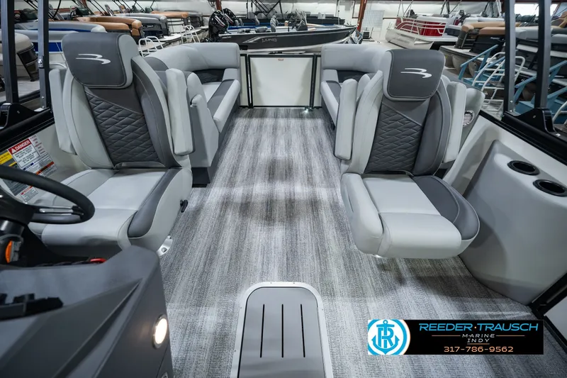 Slide: The Image of 2027 Bennington 22 SSR boat interior with plush seating and modern design. - 20