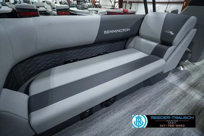 Slide: The Image of 2027 Bennington 22 SSR boat interior with sleek gray seating and modern design. - 52