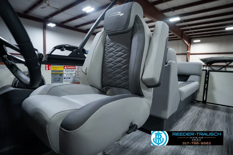 Slide: The Image of 2027 Bennington 22 SSR boat interior with luxurious seating and modern design. - 47