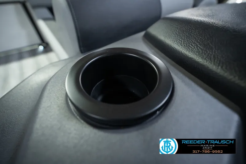 Slide: The Image of Close-up of a cup holder in a 2027 Bennington 22 SSR boat interior. - 54